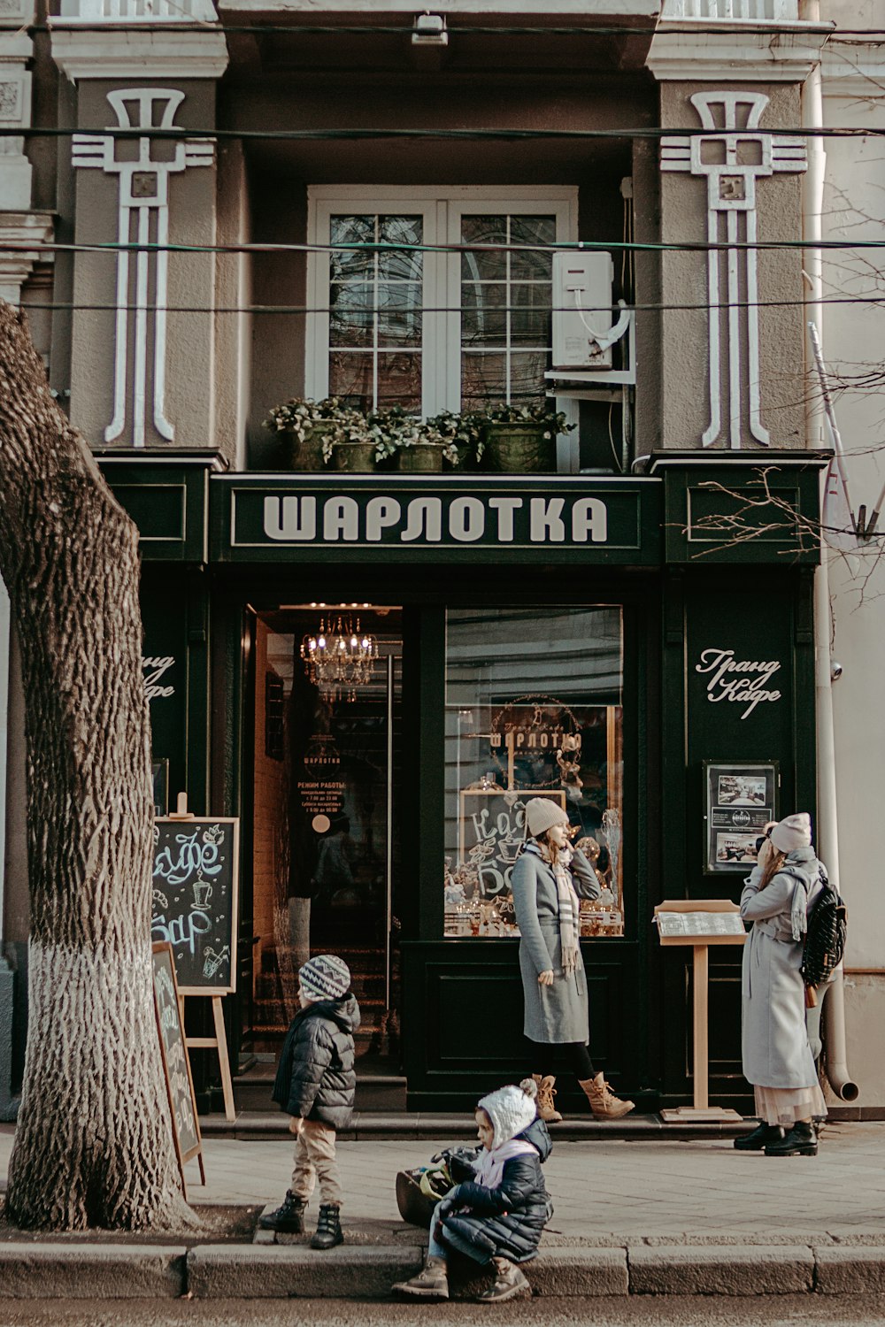 man standing near store