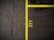 A dark asphalt surface is divided by bright yellow lines, with the number '442' marked beside the lines. The texture of the asphalt is rough and contains small pebbles and imperfections.