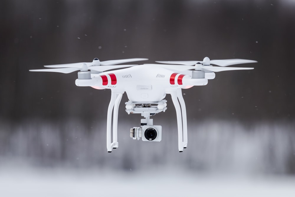 white and red drone