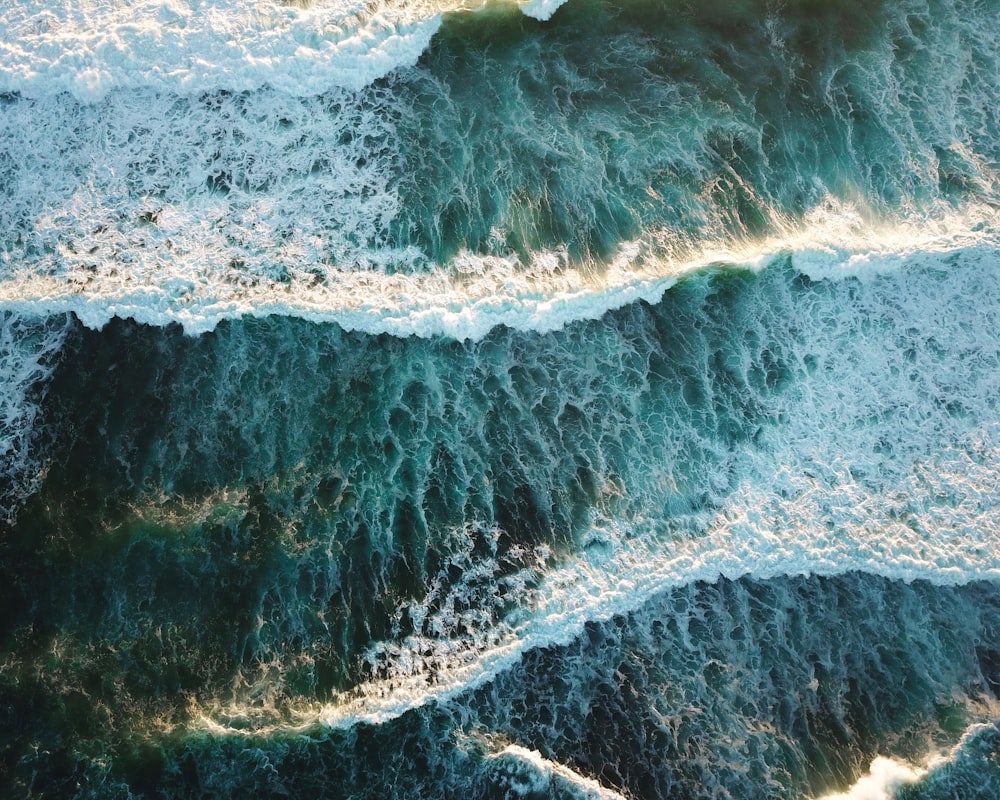 waves crashing through shores
