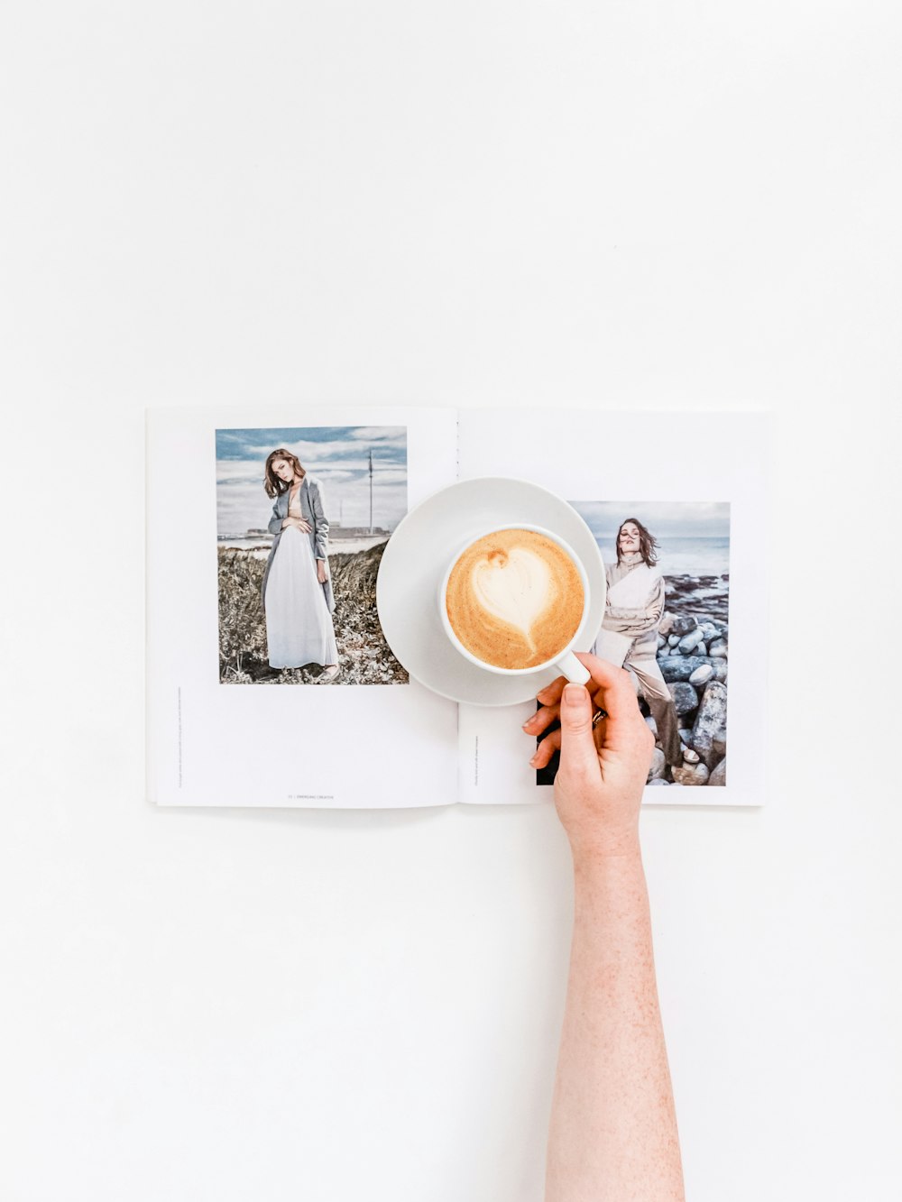 person holding cup of coffee