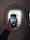 A close-up of a smartphone displaying flight information.