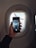 A close-up of a smartphone displaying flight information.