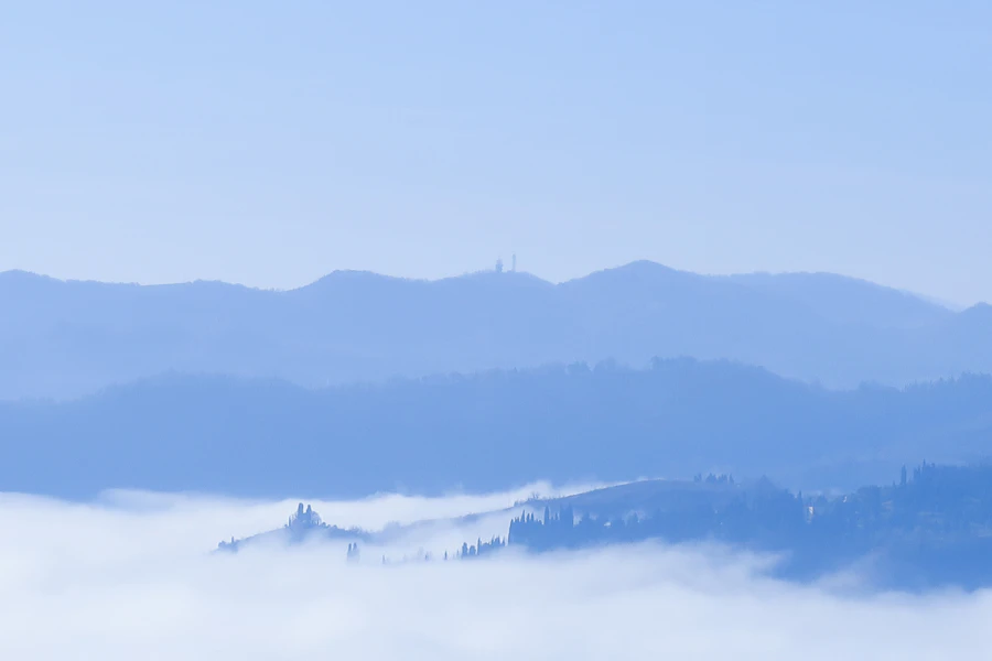 Sea of clouds crossing a mountain range