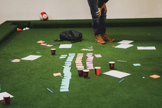 cups on green pool table