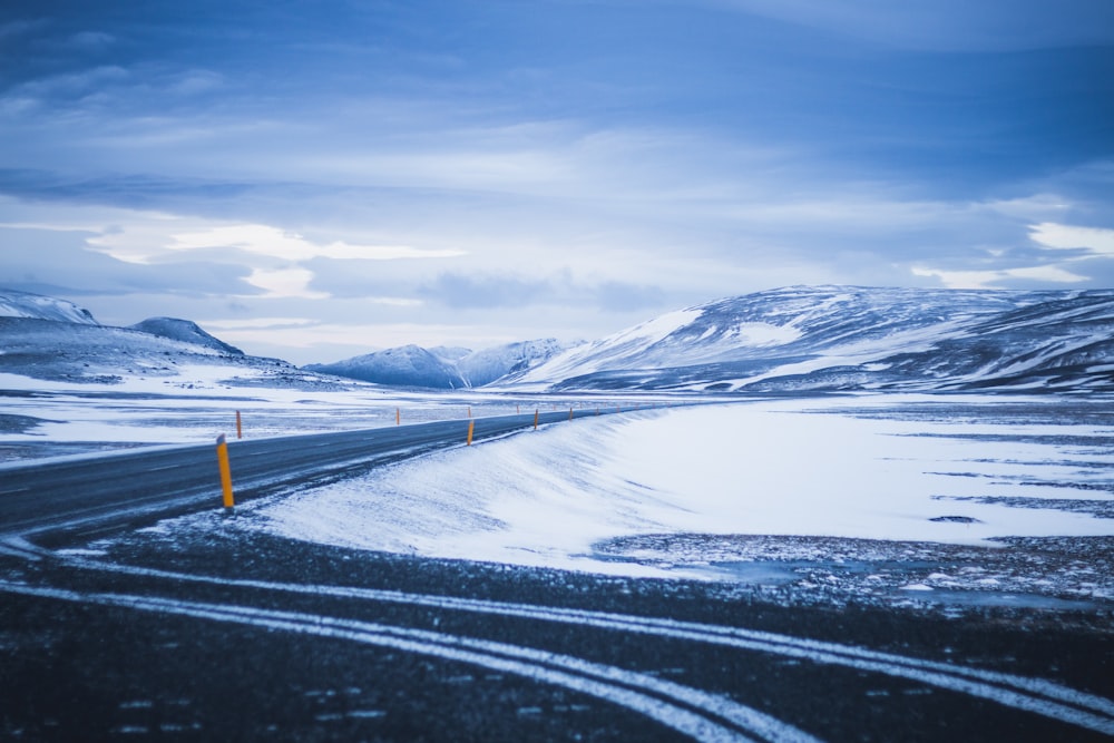 empty road filled with snow