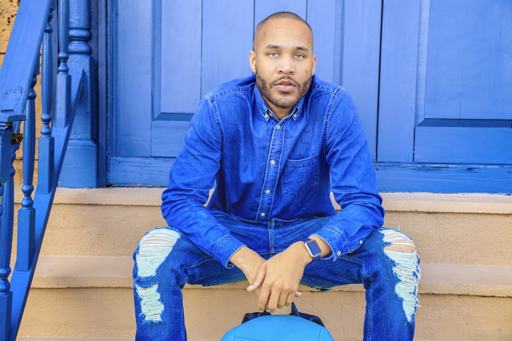 man sitting on stairs