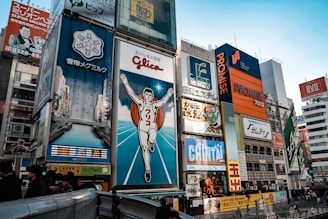 people near advertising billboards