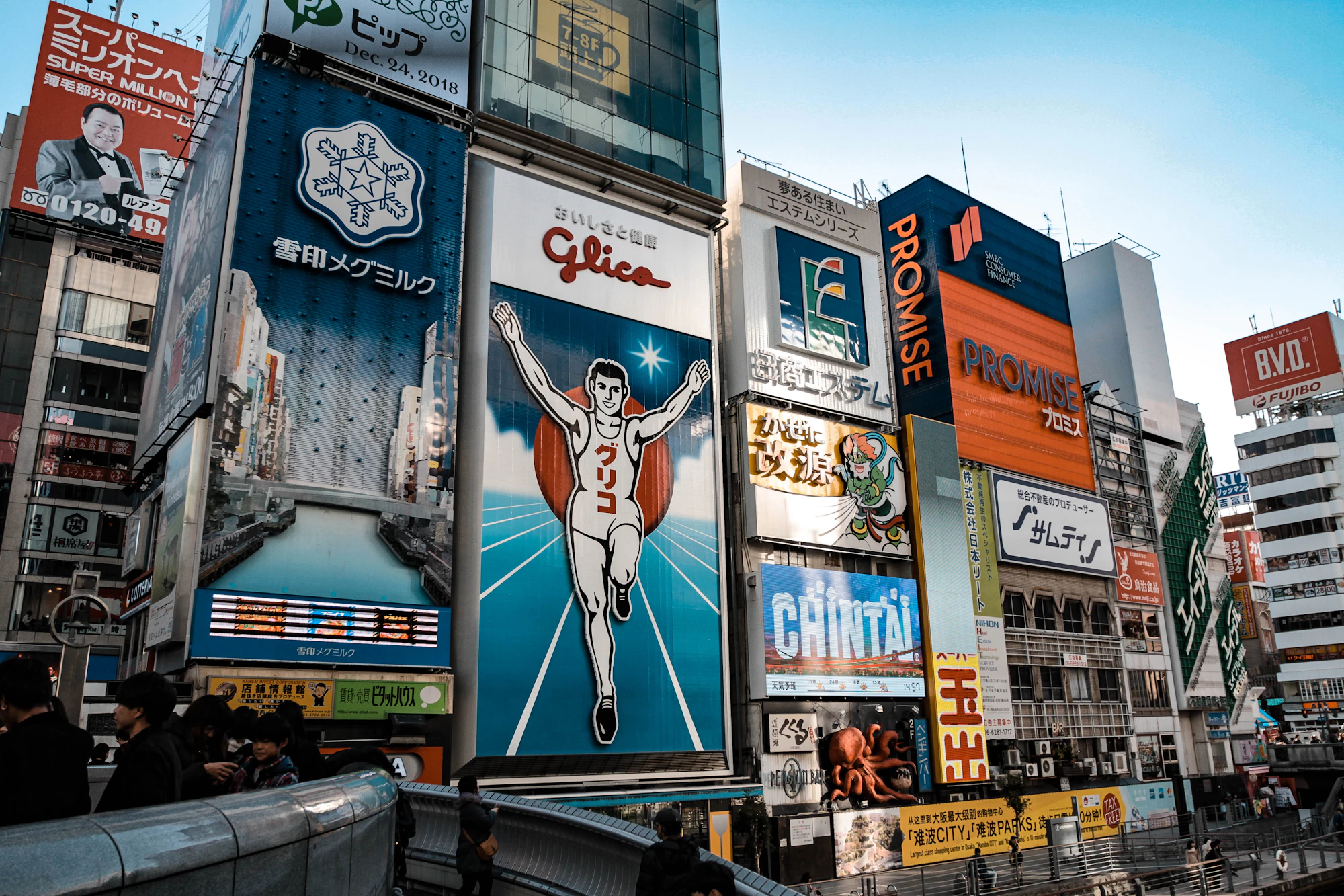 Dotonbori's Glico running man sign by daylight, Osaka