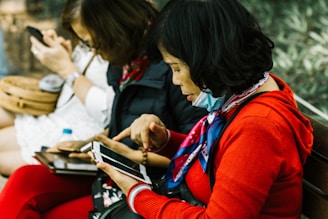 woman using white smartphone
