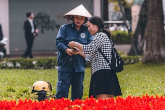 A friendly consultant assisting an Indonesian migrant worker with job information at bmi taiwan official office.