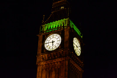 Close-up of a sleek digital carillon control panel glowing softly in a church tower.