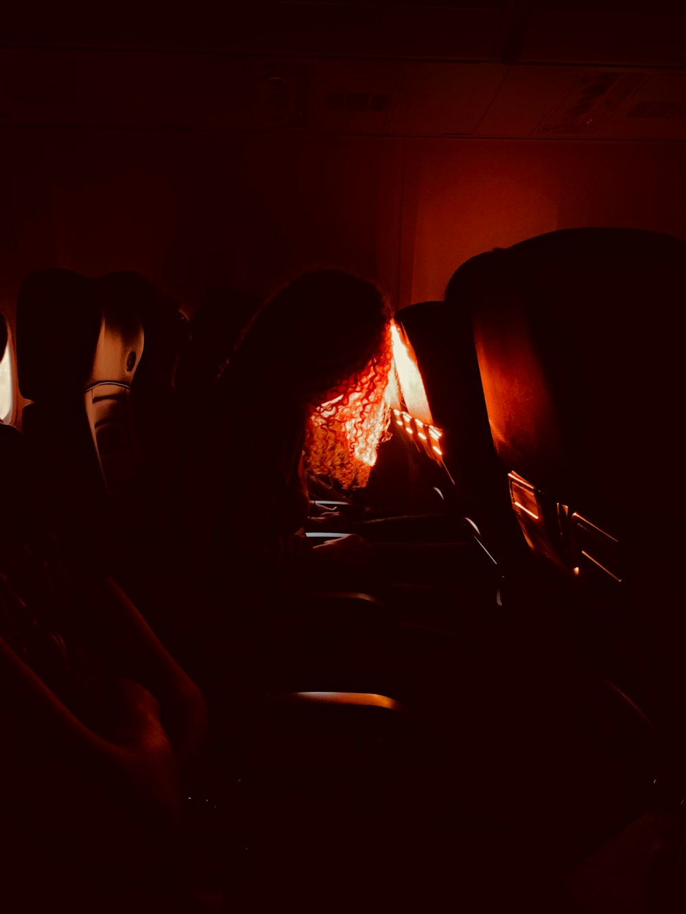 woman sitting on chair