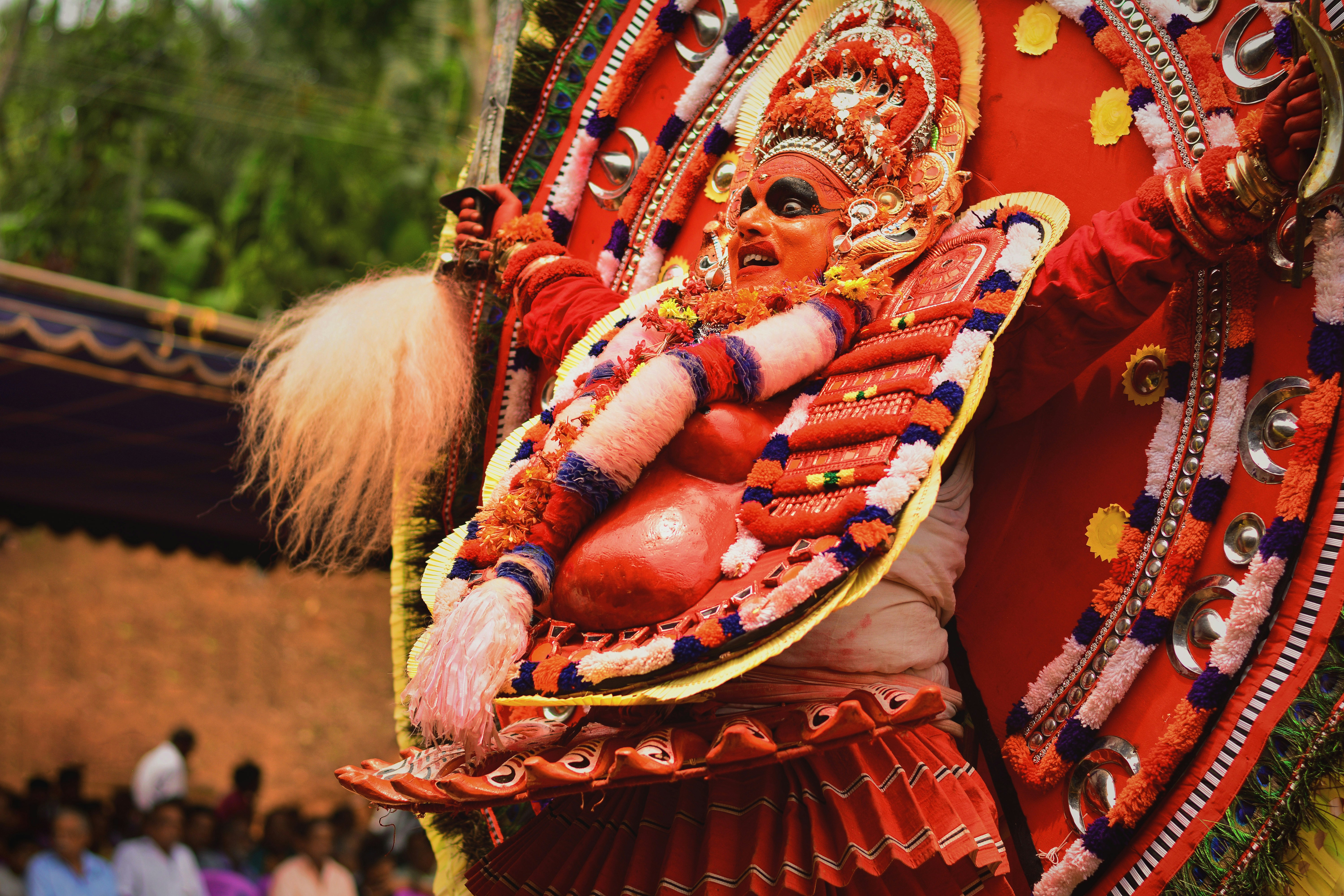 Theyyam is a ritual form in Kerala, India. If you have ever had a chance to see this ritual, you will know that the person performing the Theyyam is considered as the supreme power while in that state. This particular Theyyam is a ‘Chaamundi’, a fearsome aspect of Devi, one of the seven Matrikas (mother goddesses) in Hindu mythology. This was one of 39 Theyyam that took place at my native place spanning for a period of 3 days. This still perfectly portrays the spine-chilling energy of the epitome while he performs the ritual with sheer faith and zeal.