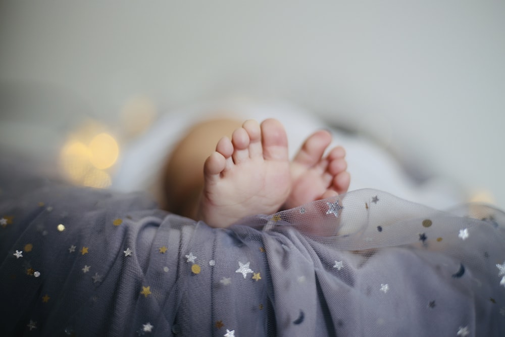 selective focus photography of human foot