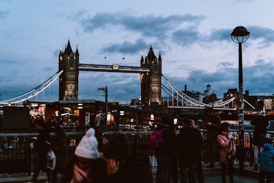 A scenic view of the historic Tower Bridge in London during sunset.