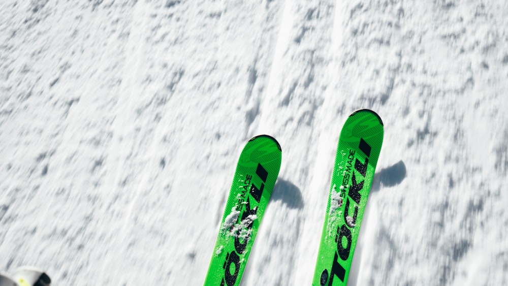 pair of green snow ski blades
