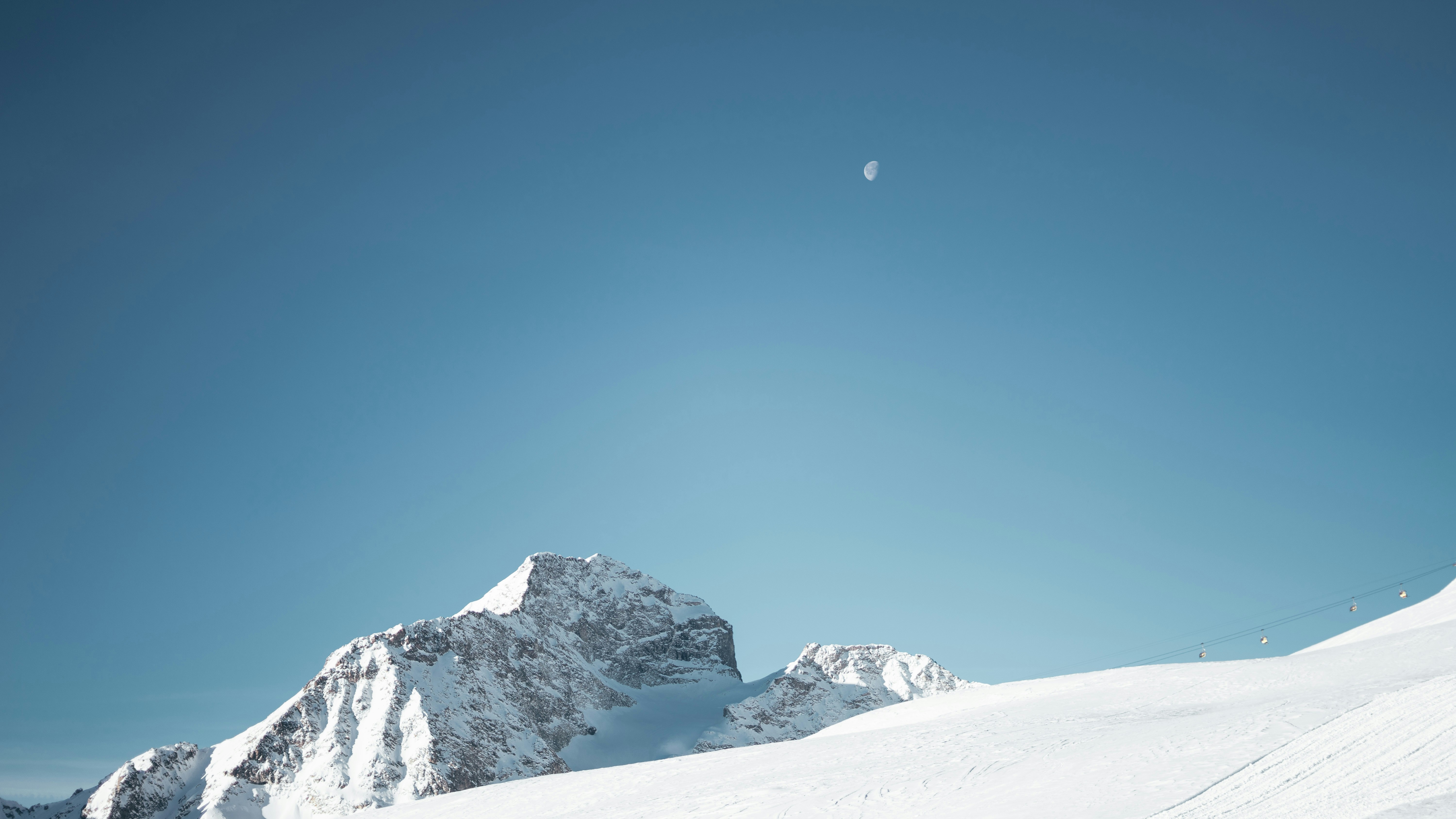 snow covered mountain during day, Skiing in St.Moritz