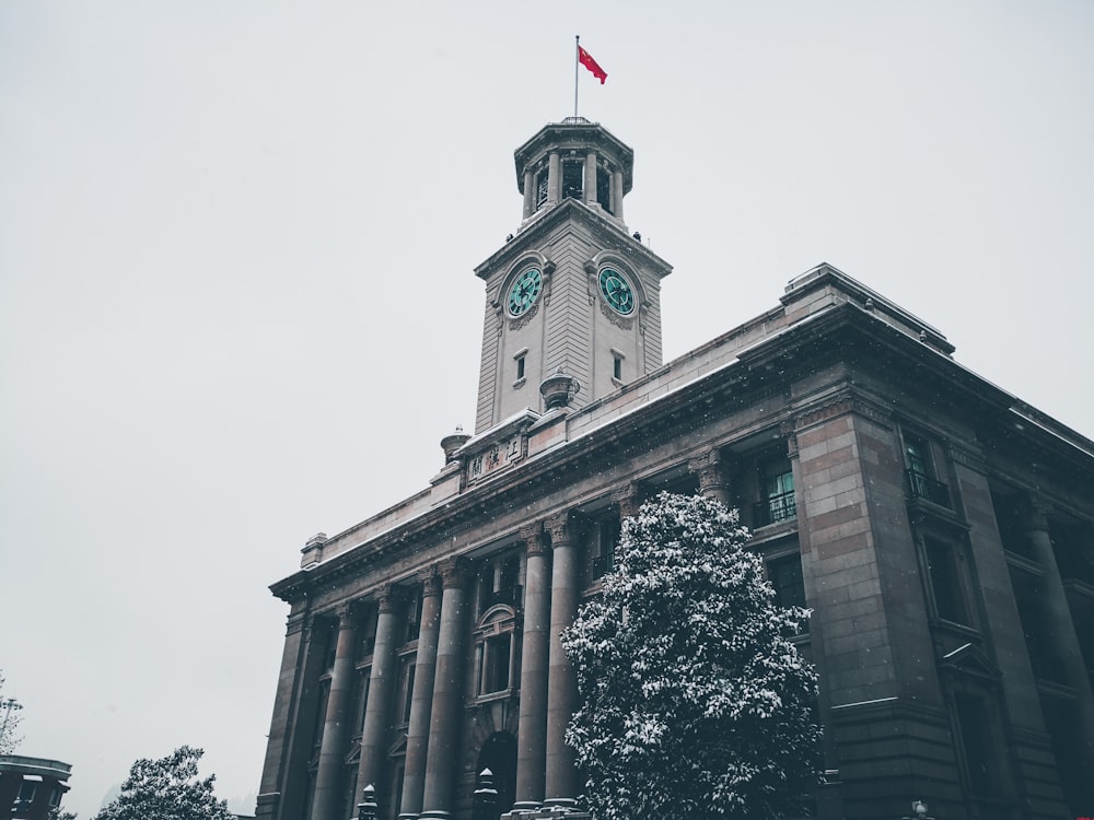 brown building with clock