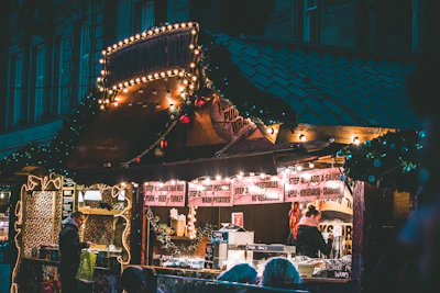 A cozy food stall bustling with customers enjoying fresh snacks.