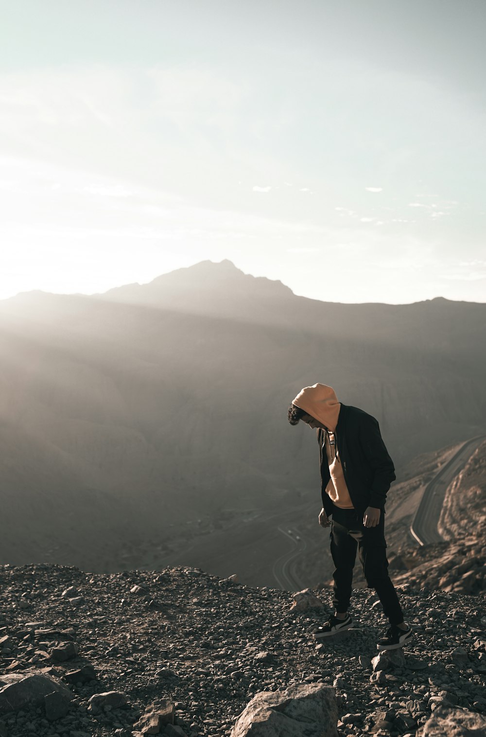 rule of thirds photography of person standing outdoor