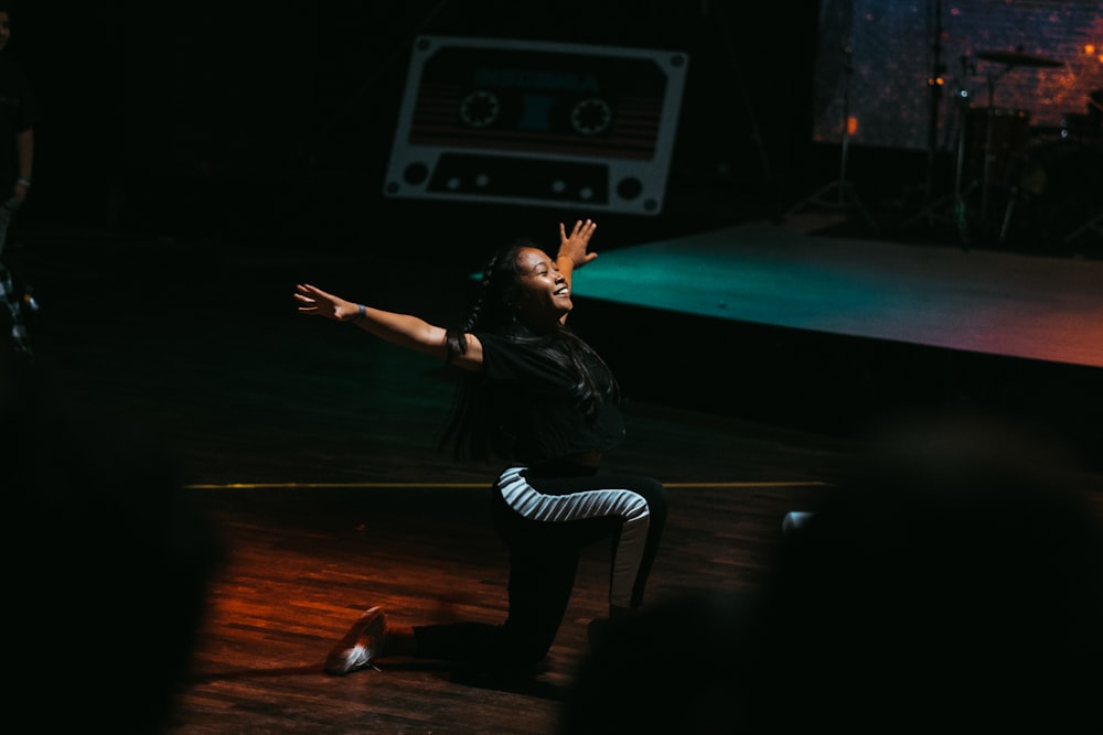 woman kneeling on floor