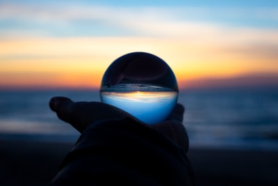 clear magic ball into sunset