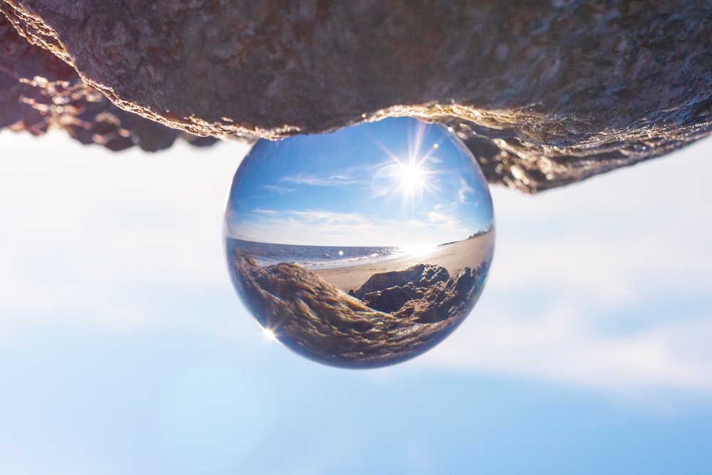 crystal ball on rock formation