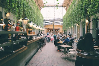 people sitting inside restaurant tables