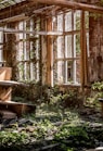 brown wooden table in room with leaves