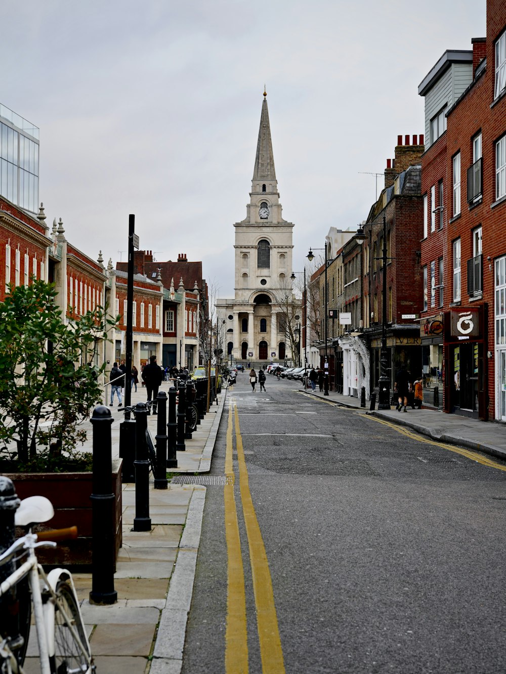 group of people near brown buildings