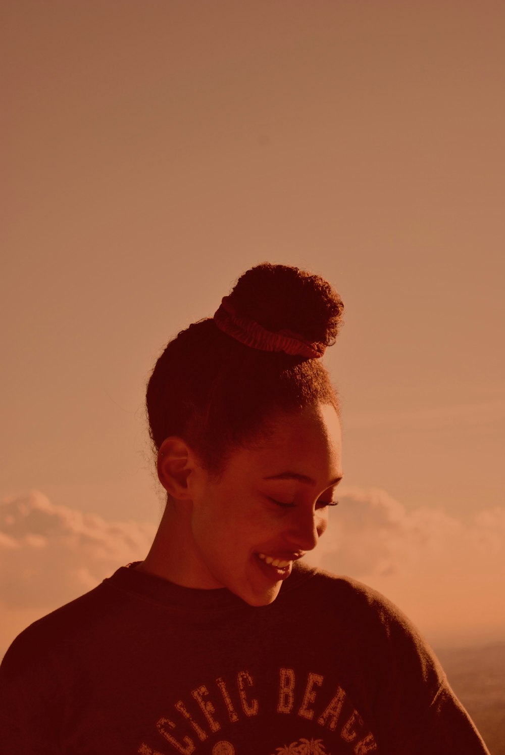 smiling woman during golden hour
