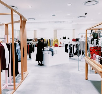 woman standing inside a clean and mopped retail store