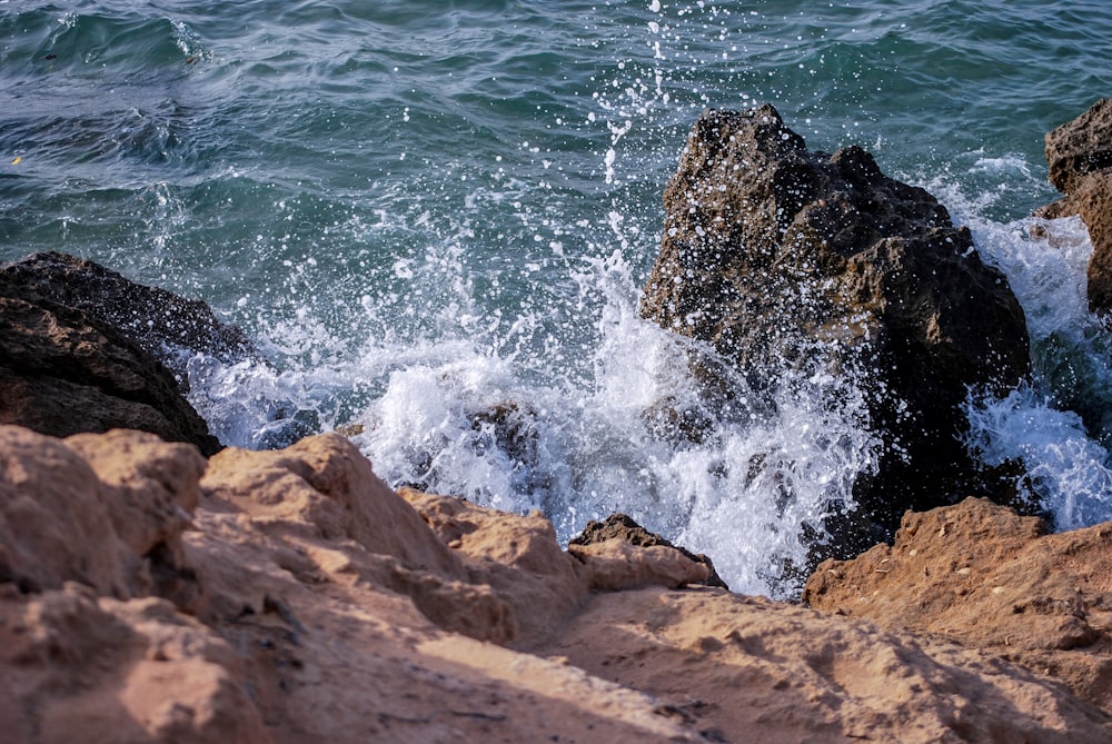 water crashing on rocks