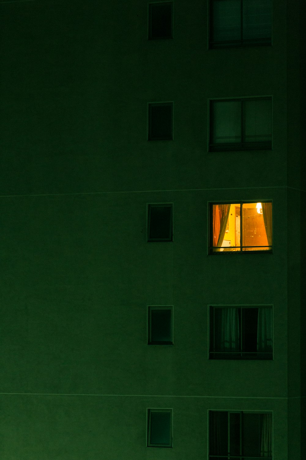 opened window inside concrete apartment