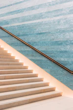 A newly installed grab bar next to a staircase, highlighting thoughtful home adaptation.