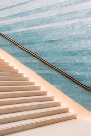 A newly installed grab bar next to a staircase, highlighting thoughtful home adaptation.