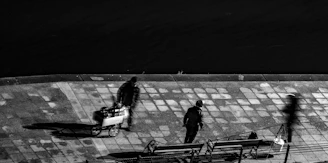 A dynamic black and white street photography scene.