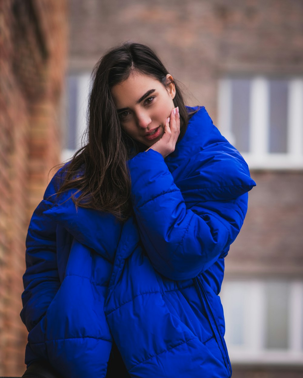 woman in blue jacket