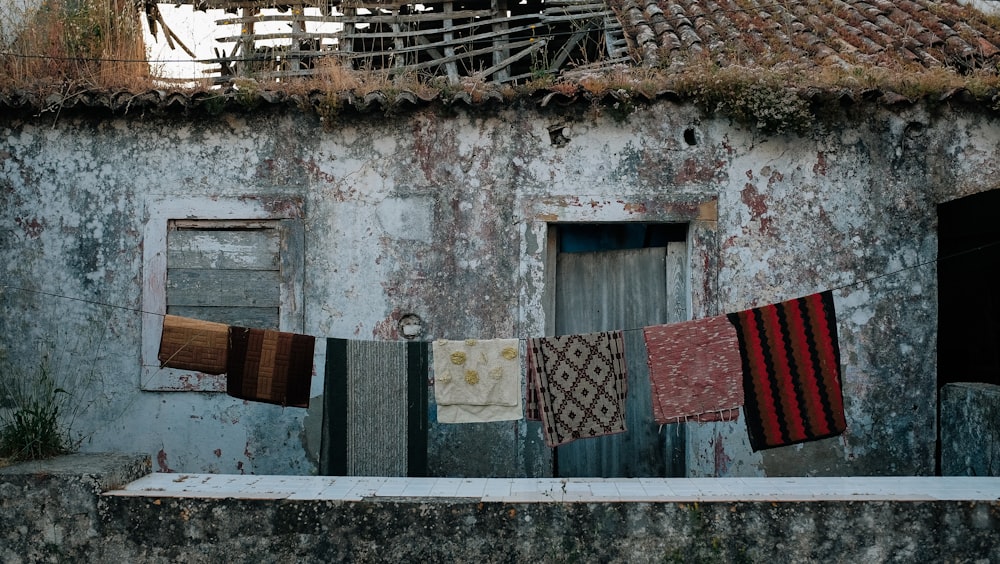 clothes hanged on clothesline outside house