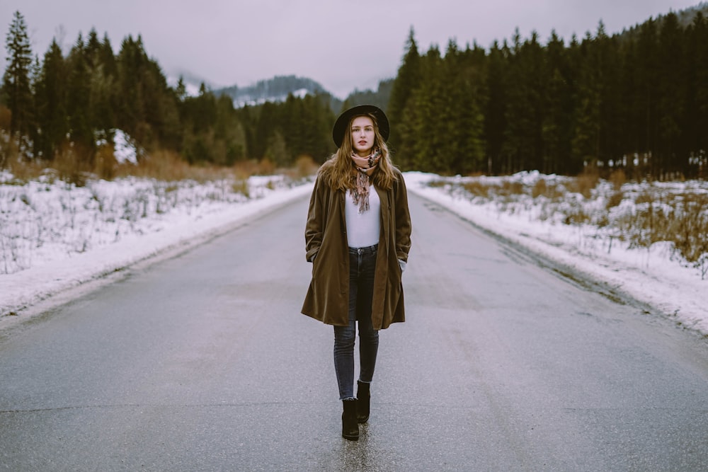 woman standing on road