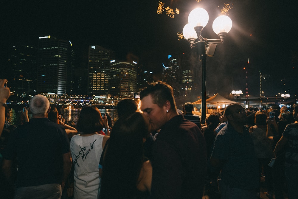 man and woman kissing