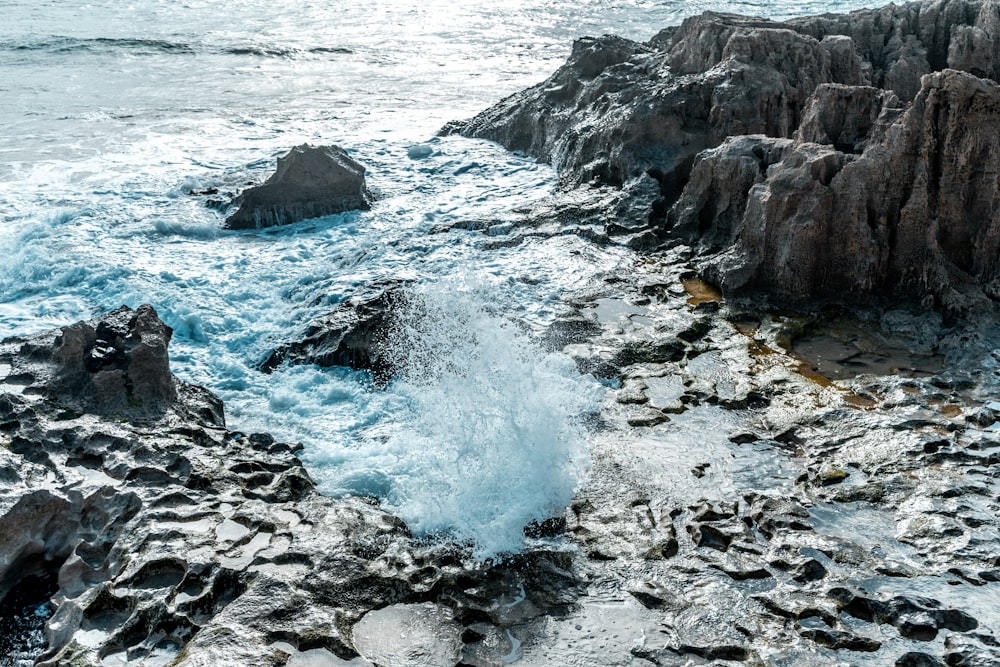 gray rocks on sea