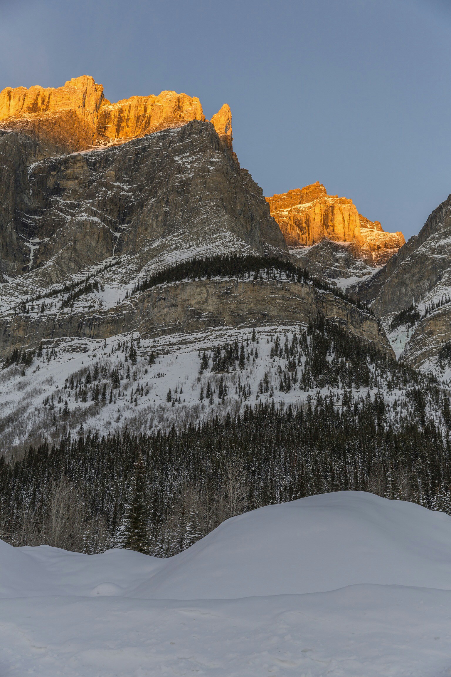 snow covered mountain during daytime