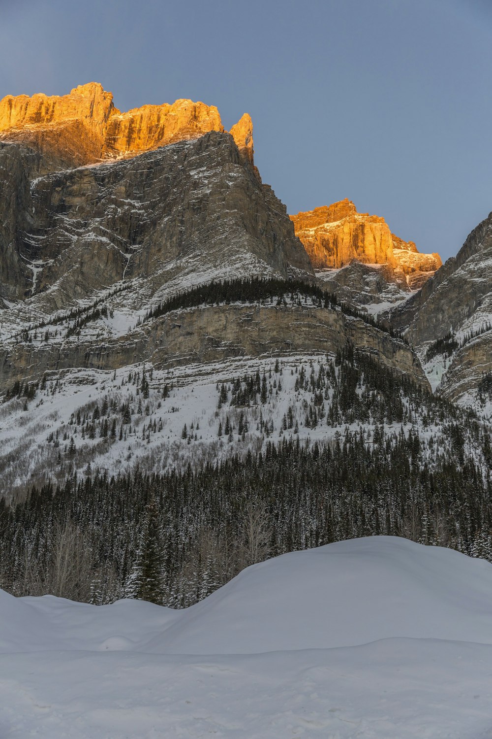 snow covered mountain during daytime