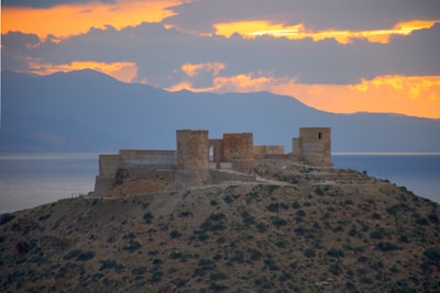 landscape photography of castle under blue sky eve google meet background