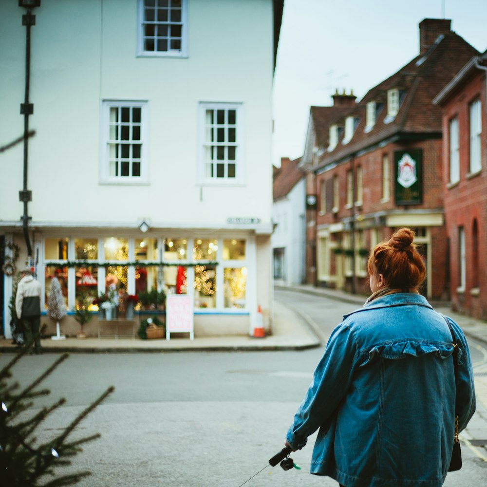 woman standing near storefront