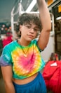 woman wearing tie dyed short sleeved crop top