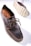 A dark brown leather shoe with detailed stitching and a thick, textured sole is prominently displayed. The shoe features a lace-up design and visible branding on the inner sole. The sole's pattern is visible, showcasing its rugged, slip-resistant design.