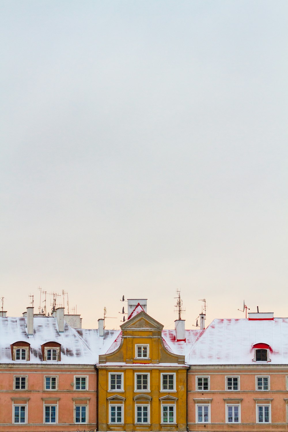 three painted houses